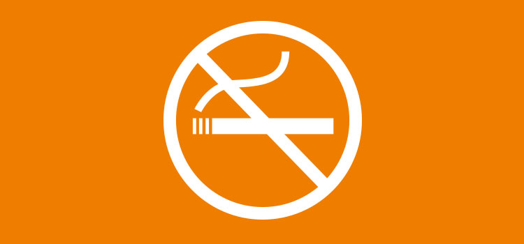 en orange färgplatta med symbolen för rökning förbjuden